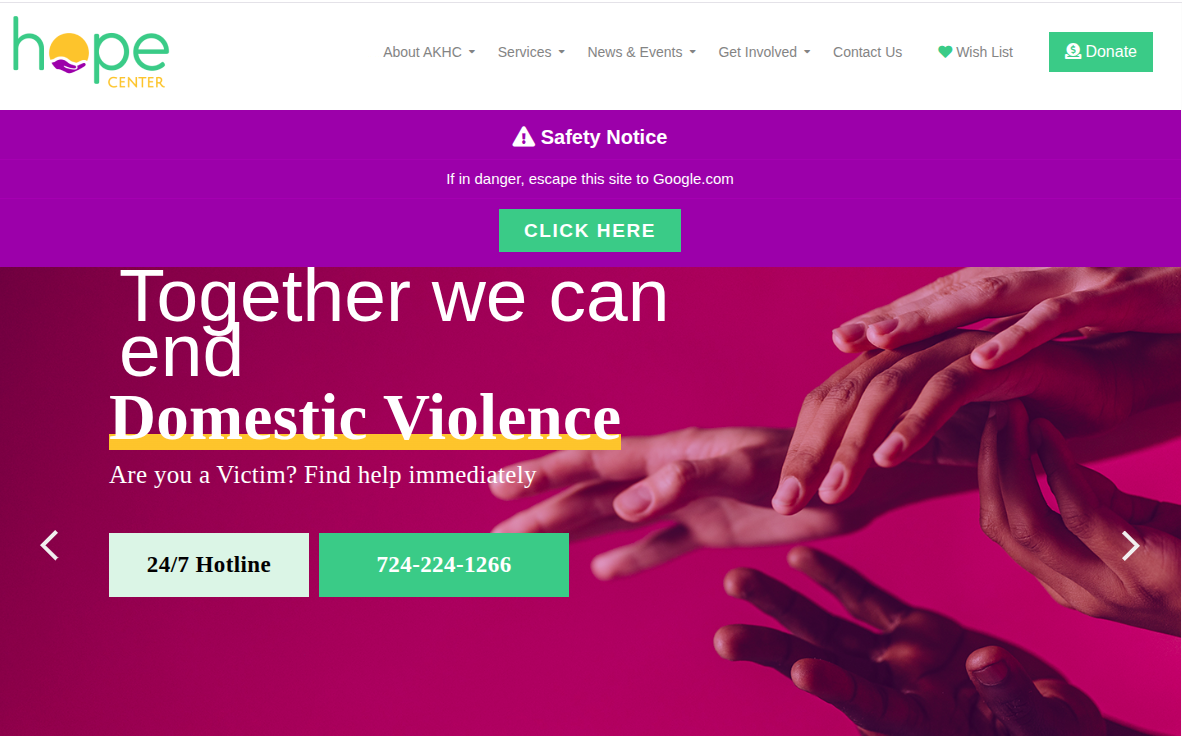Community shelter home page with safety notice and 24/7 help line
